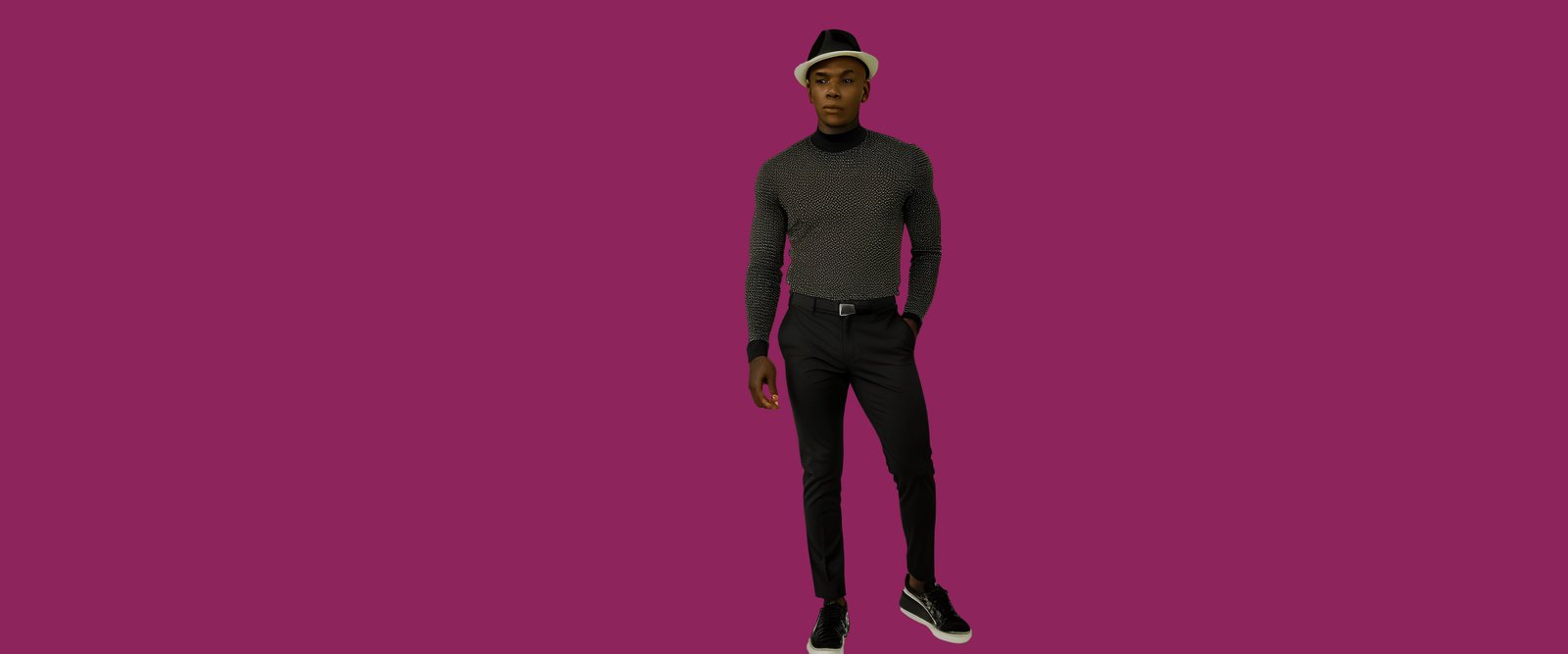 Ludwing Music in a black outfit and hat against a burgundy background